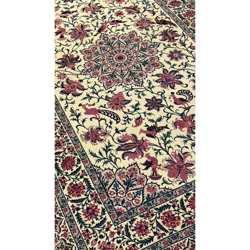 Full view of a large Sadegh Seirafian oriental rug with elaborate floral motifs