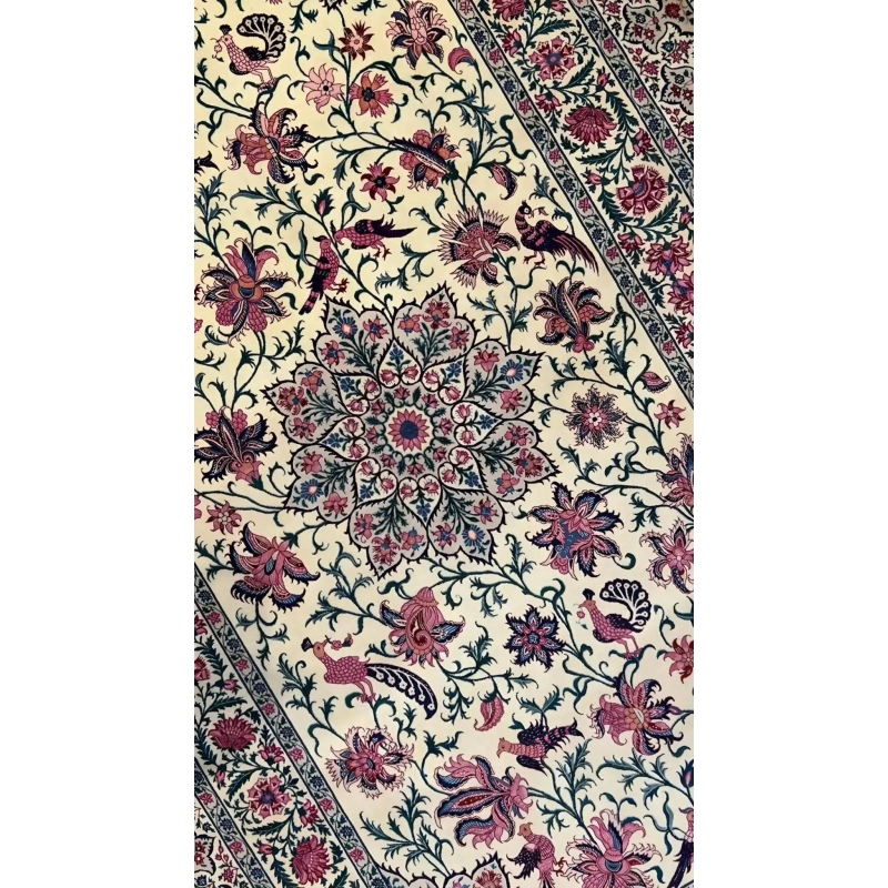 Detailed view of a Sadegh Seirafian rug showcasing intricate floral patterns