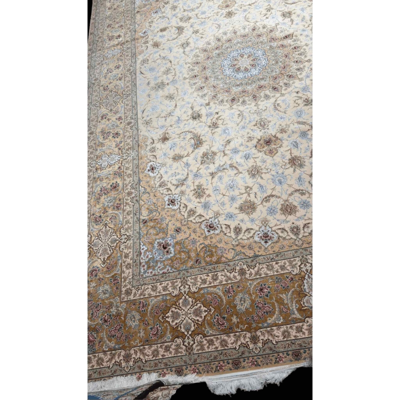 "Luxurious wool and silk Persian rug with intricate floral design in cream and gold tones."