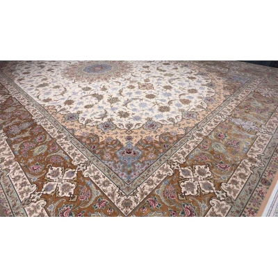 "Premium Persian wool and silk rug in gold and cream, perfect for transforming living room spaces."
