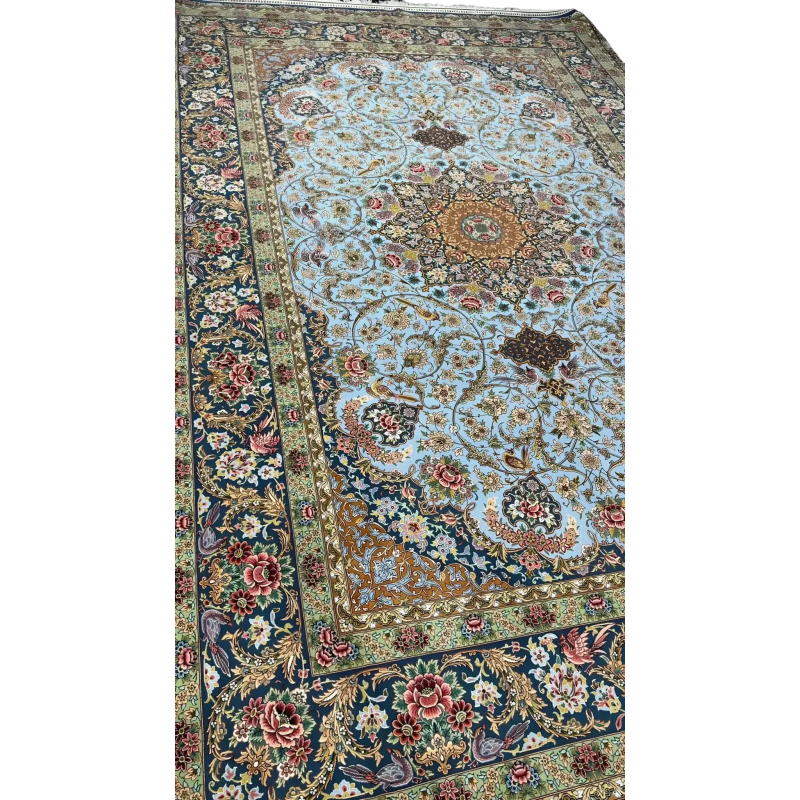 Elegant silk carpet featuring blue and green oriental motifs