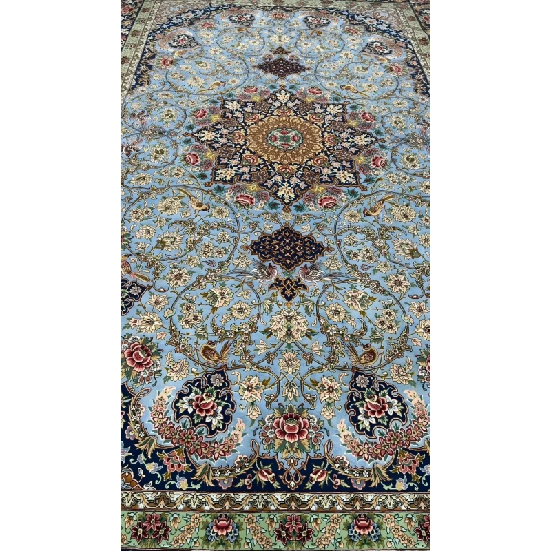 Luxurious light blue silk floor carpet with oriental design elements