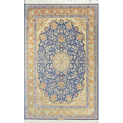 "Luxurious handmade blue Persian rug from Isfahan, Iran, crafted with silk and wool."

