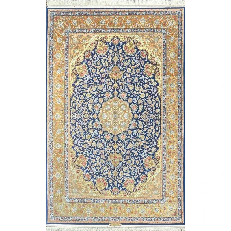 "Luxurious handmade blue Persian rug from Isfahan, Iran, crafted with silk and wool."