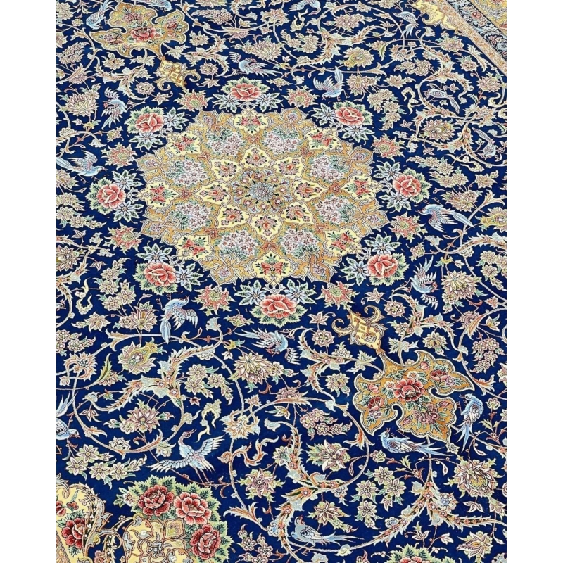 "Elegant navy blue Persian rug with intricate floral patterns and silk accents, hand-knotted."