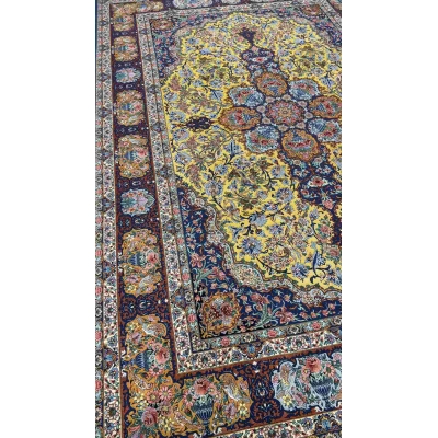 "Close-up view of the intricate floral design and silk field on the Isfahan Persian rug."