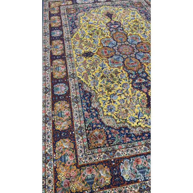 "Close-up view of the intricate floral design and silk field on the Isfahan Persian rug."