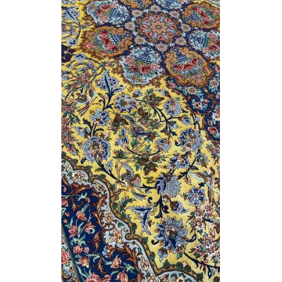 "Elegant Isfahan Oriental rug with detailed floral patterns and silk accents, 10.2 x 6.9 feet."