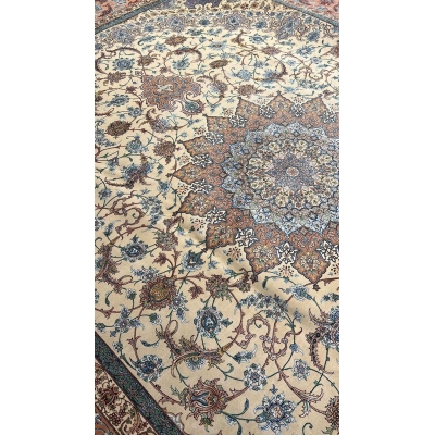 "Luxury wool and silk Isfahan Persian rug, masterfully crafted by Habib, featuring intricate blue, beige, and rust motifs."
