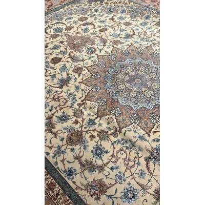 "Luxury wool and silk Isfahan Persian rug, masterfully crafted by Habib, featuring intricate blue, beige, and rust motifs."
