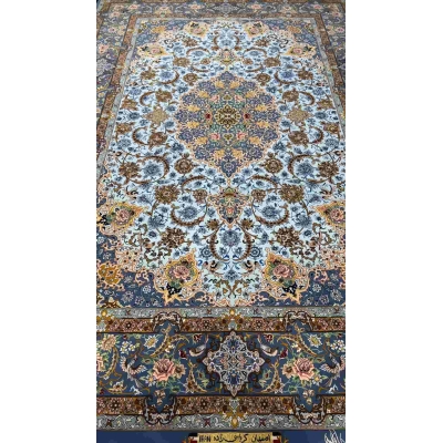 "Side view of the finest light blue Persian carpet, showcasing the hand-knotted craftsmanship."