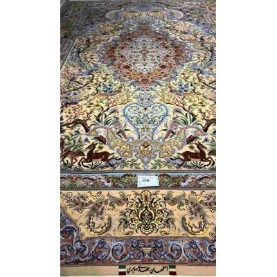"Colorful Isfahan silk rug with intricate floral and animal motifs, 10.2 x 6.7 feet."

