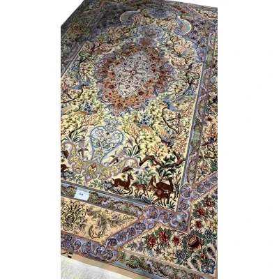 "Masterfully crafted Isfahan silk rug by Mehdie Saberie, showcasing vibrant colors and Persian artistry."