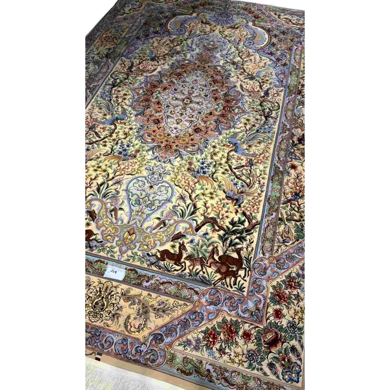 "Masterfully crafted Isfahan silk rug by Mehdie Saberie, showcasing vibrant colors and Persian artistry."
