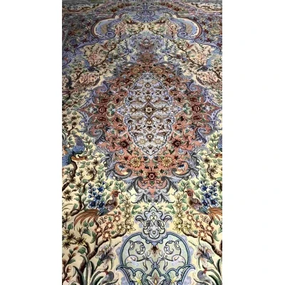 "Close-up of the detailed silk field floor on the hand-knotted Isfahan Persian rug."