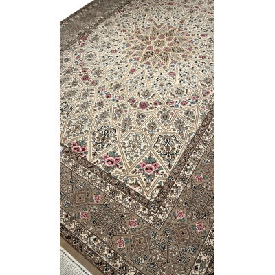 Full view of a beige Persian rug with elaborate floral designs