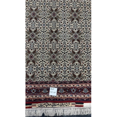 "Vintage Sadegh Seirafian rug with detailed floral designs in traditional Persian style, crafted from wool and silk, perfect for adding luxury to any space."