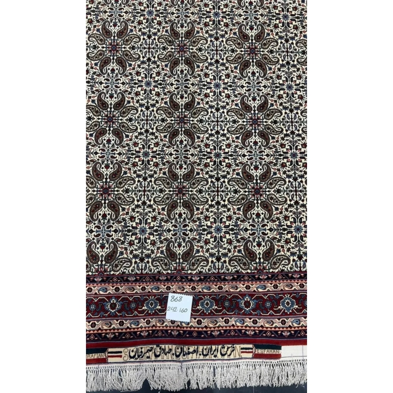 "Vintage Sadegh Seirafian rug with detailed floral designs in traditional Persian style, crafted from wool and silk, perfect for adding luxury to any space."