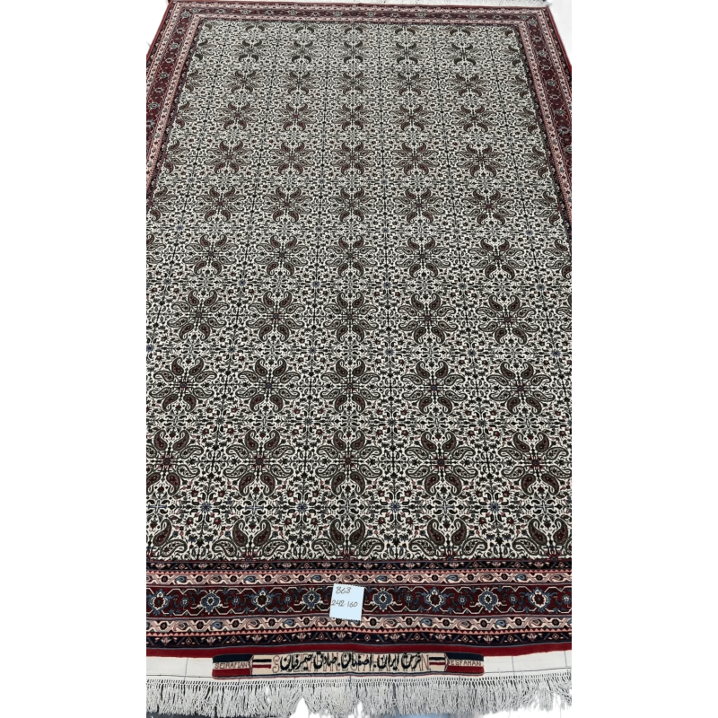 "Hand-knotted Sadegh Seirafian Persian rug featuring intricate symmetrical floral motifs with high knot density, originating from Isfahan."