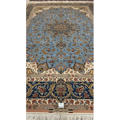 "Full view of the Sheikh Bahaie Isfahan Persian rug, showcasing rich blue tones and intricate border design."