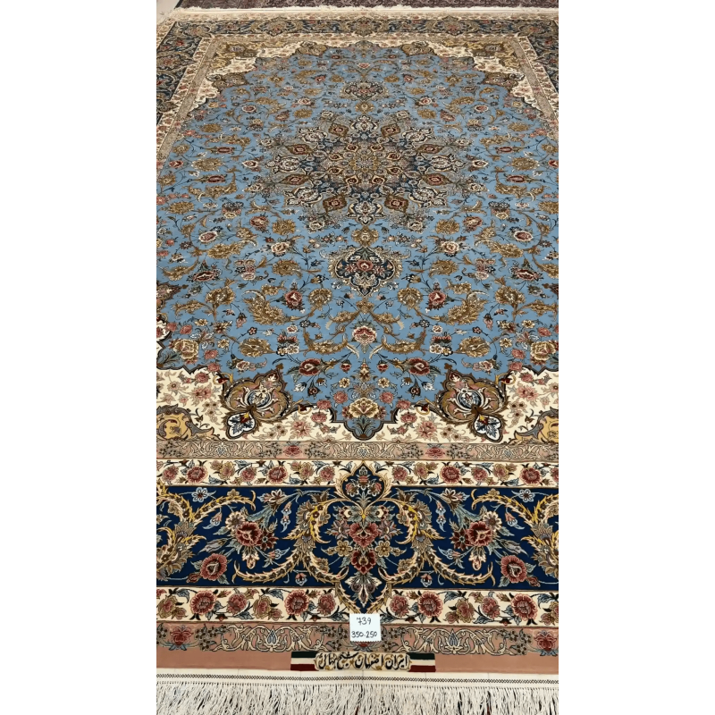 "Full view of the Sheikh Bahaie Isfahan Persian rug, showcasing rich blue tones and intricate border design."