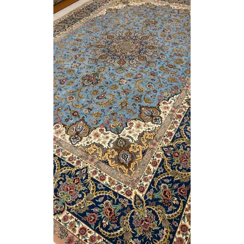 "Detailed corner view of a Persian Sheikh Bahaie rug, with floral motifs and a blend of silk and wool."