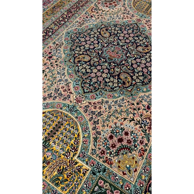 Close-up of Samavie Rug's Central Medallion – A close-up shot highlighting the exquisite central medallion of the Samavie Persian rug, featuring delicate floral designs in soft blues, pinks, and greens.