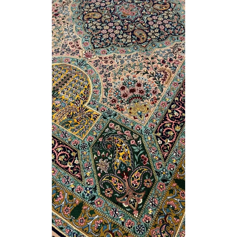 Corner Detail of Samavie Persian Rug – A close-up shot of the corner of the Samavie Persian rug, highlighting the intricate floral design and vibrant color contrasts in the wool and silk blend.