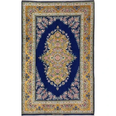 Isfahan Fine Rugs with Blue empty field an golden border