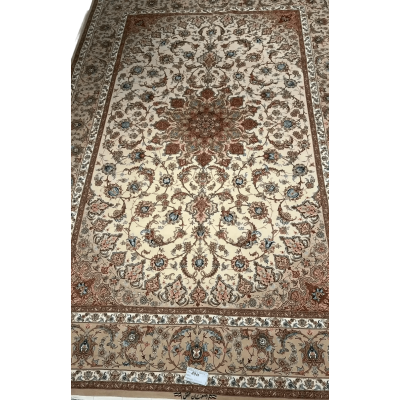  "Hand-knotted luxury Persian rug made of silk and wool from Isfahan, featuring traditional Iranian patterns, 9.8x6.5 feet, crafted by skilled weaver Mohaghegh." ​