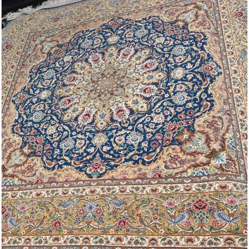 "Square Persian rug, 250 cm, made with wool and silk, handcrafted in Isfahan, Iran. This rug’s vibrant design and premium materials make it a must-have for sophisticated spaces."