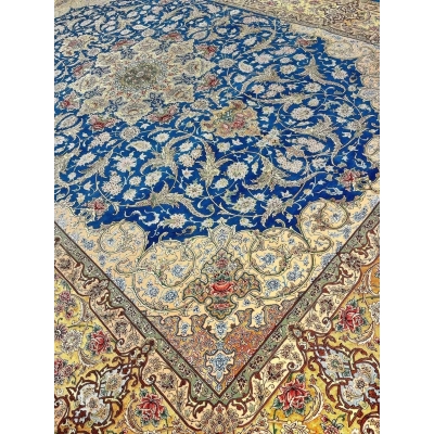 "Persian silk and wool rug, handmade in Isfahan, offering soft texture and intricate design."
