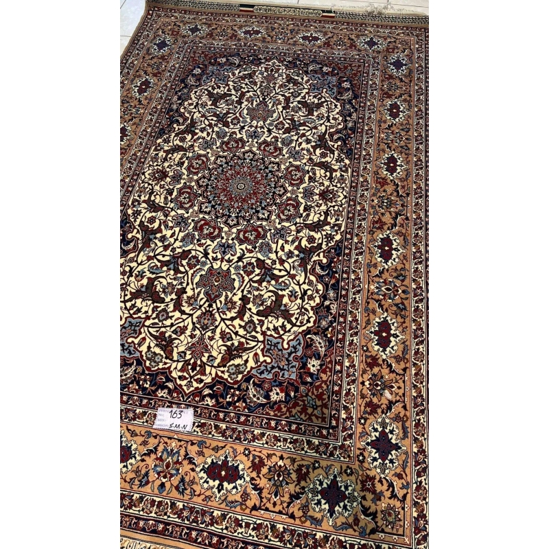 "Authentic Seirafian rug for sale, featuring detailed Persian craftsmanship, made from wool and silk with traditional floral patterns."