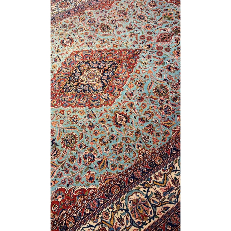"Close-up of vintage Persian Kashan rug showing floral medallion and high knot density"