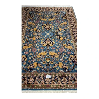 60-year-old antique Tabriz rug with intricate floral design, 282 x 198 cm.