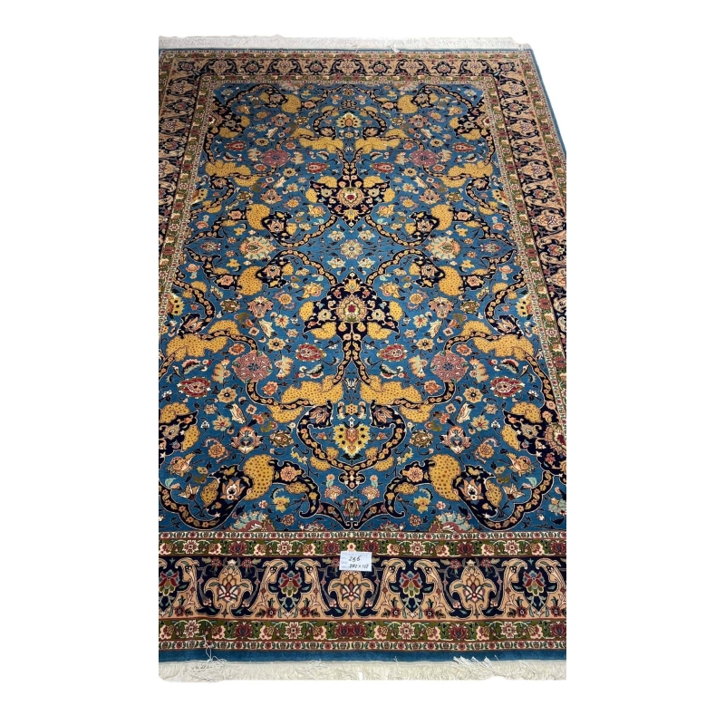 60-year-old antique Tabriz rug with intricate floral design, 282 x 198 cm.
