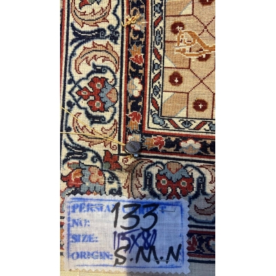 Backside of the beige Seirafian pictorial Persian rug, revealing the fine hand-knotted craftsmanship.