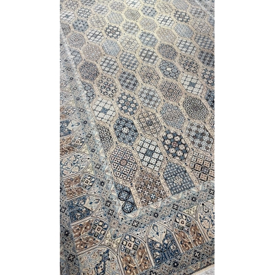 Persian Nain rug in beige, blue, and ivory with intricate hexagonal patterns.