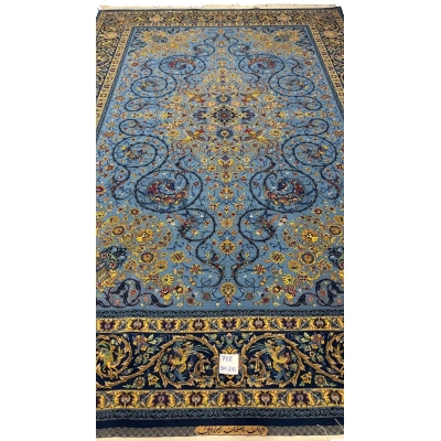 Luxurious blue Persian rug with intricate silk and wool patterns