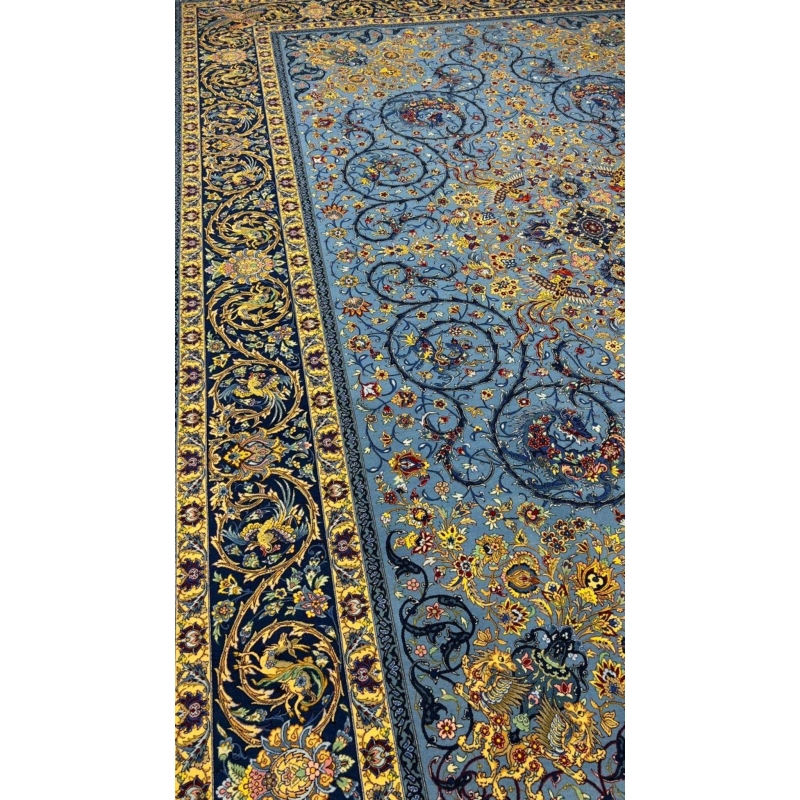 Traditional Persian rug with a blue background and floral motifs