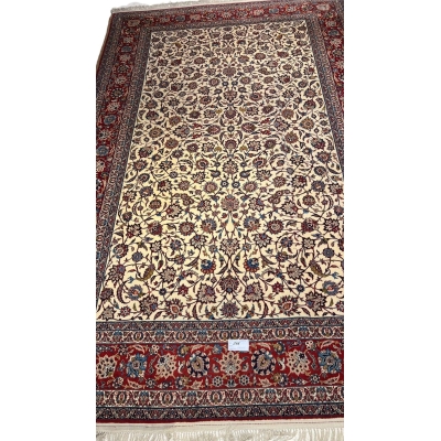 "Vintage Isfahan rug with intricate floral design, hand-knotted in Iran"