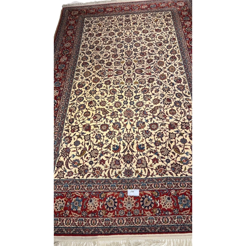 "Vintage Isfahan rug with intricate floral design, hand-knotted in Iran"