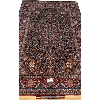 "Persian rug from Isfahan, genuine Seirafian carpet in red and beige tones."