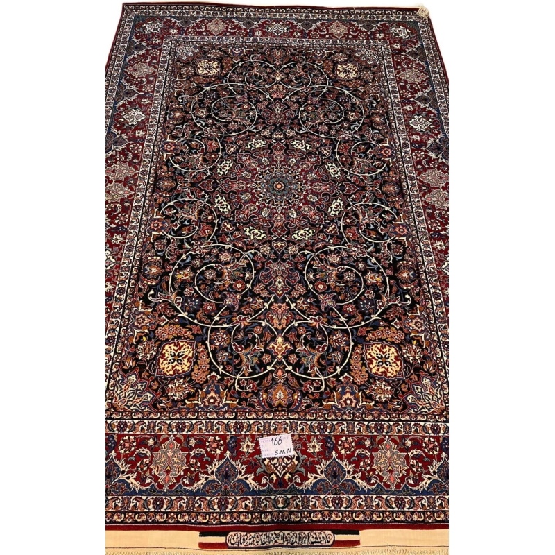 "Persian rug from Isfahan, genuine Seirafian carpet in red and beige tones."