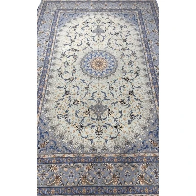 "Hand-knotted light blue Isfahan Persian rug, 303x207 cm, silk and wool blend, by Taghie Zadeh."
