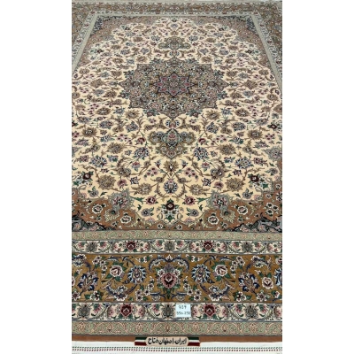 Full display of the elegant beige hand-knotted Iranian rug with floral designs