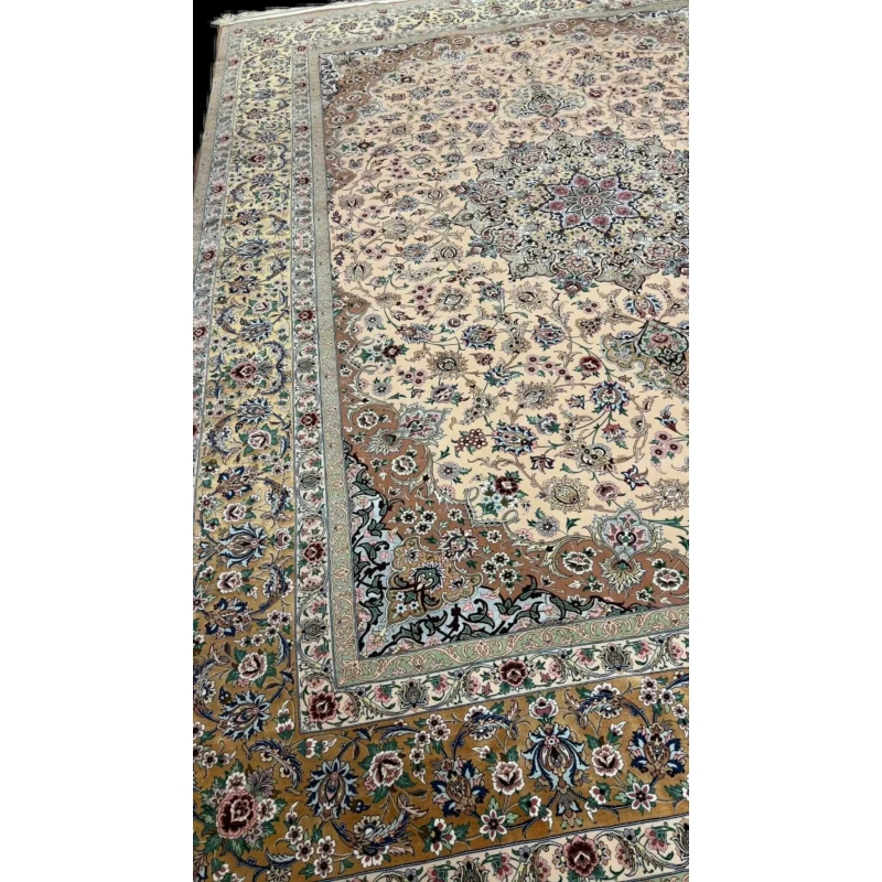 Beige hand-knotted Iranian rug with intricate floral patterns