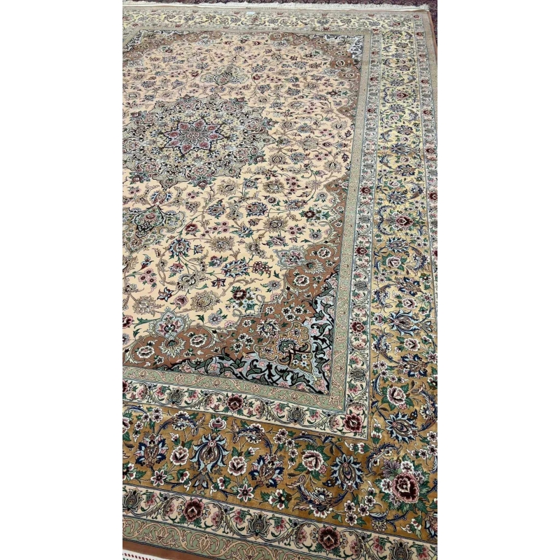 Elegant beige Iranian rug placed on a wooden floor