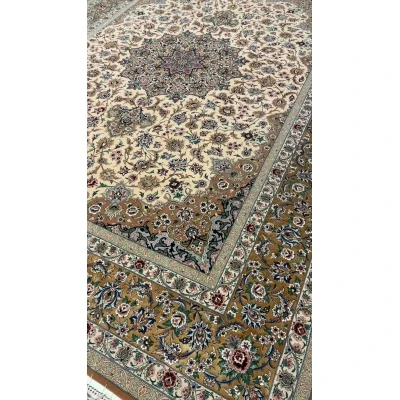 Corner perspective of the elegant beige Iranian rug with hand-knotted craftsmanship