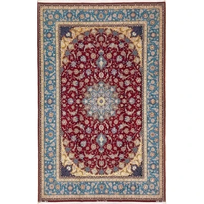Hand-knotted Persian rug from Isfahan, Iran, featuring intricate silk and wool designs, measuring 300 cm x 200 cm.

